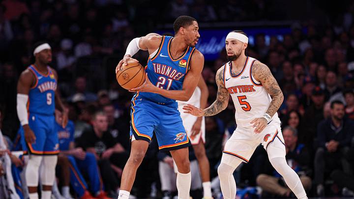 Mar 4, 2026; New York, New York, USA; Oklahoma City Thunder guard Aaron Wiggins (21) shields the ball away from New York Knicks guard Jose Alvarado (5) during the second half at Madison Square Garden. Mandatory Credit: Vincent Carchietta-Imagn Images