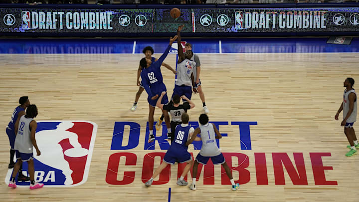 May 14, 2024; Chicago, IL, USA; Adam Bona (90) and Urich Chomche (62) go for a jump ball during the 2024 NBA Draft Combine at Wintrust Arena. Mandatory Credit: David Banks-USA TODAY Sports May 14, 2024; Chicago, IL, USA; Adam Bona (90) and Urich Chomche (62) go for a jump ball during the 2024 NBA Draft Combine at Wintrust Arena. Mandatory Credit: David Banks-USA TODAY Sports