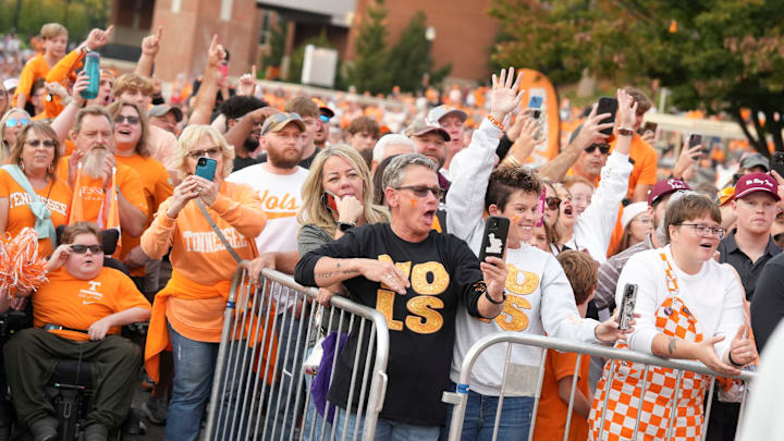 Tennessee fans yell out to Tennessee quarterback Nico Iamaleava (8) during the Vol Walk ahead of the NCAA college football game between Tennessee and Mississippi State on Saturday, Nov. 9, 2024, in Knoxville, Tenn.