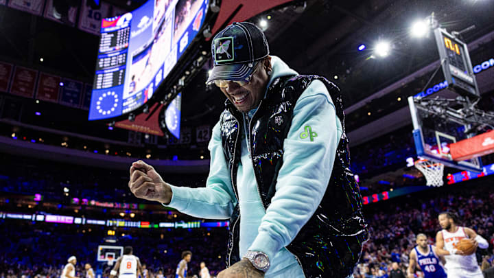 Apr 25, 2024; Philadelphia, Pennsylvania, USA; Former Philadelphia 76ers and hall of fame member Allen Iverson reacts after a 76ers score against the New York Knicks during the second half of game three of the first round for the 2024 NBA playoffs at Wells Fargo Center. Mandatory Credit: Bill Streicher-Imagn Images