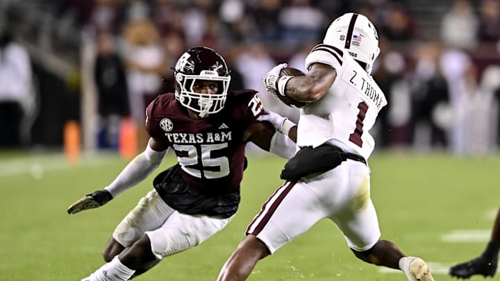 Nov 11, 2023; College Station, Texas, USA; Texas A&M Aggies defensive back Dalton Brooks (25) tackles Mississippi State Bulldogs wide receiver Zavion Thomas (1) during the fourth quarter at Kyle Field. Mandatory Credit: Maria Lysaker-Imagn Images Nov 11, 2023; College Station, Texas, USA; Texas A&M Aggies defensive back Dalton Brooks (25) tackles Mississippi State Bulldogs wide receiver Zavion Thomas (1) during the fourth quarter at Kyle Field. Mandatory Credit: Maria Lysaker-Imagn Images