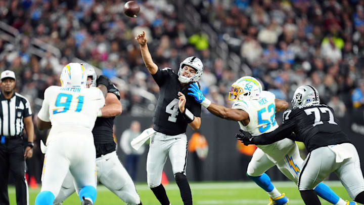 Dec 14, 2023; Paradise, Nevada, USA;  Las Vegas Raiders quarterback Aidan O'Connell (4) throws a