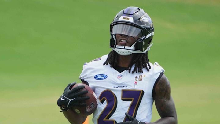 Baltimore Ravens cornerback T.J. Tampa Jr. runs drills during training camp. Mandatory Credit: Mitch Stringer-Imagn Images