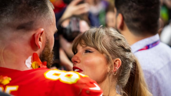 Feb 11, 2024; Paradise, Nevada, USA; Kansas City Chiefs tight end Travis Kelce (87) celebrates with girlfriend Taylor Swift after defeating the San Francisco 49ers in Super Bowl LVIII at Allegiant Stadium. Mandatory Credit: Mark J. Rebilas-USA TODAY Sports