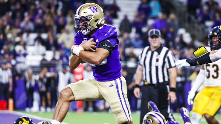 Huskies running back Sam Adams II rushes for a touchdown against the California Golden Bears in 2023. 