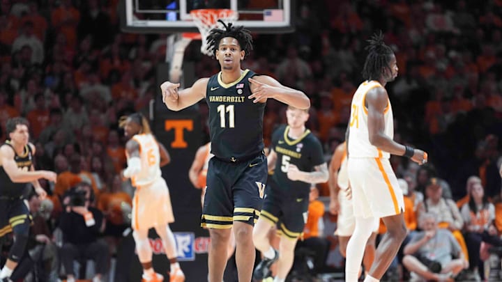 Vanderbilt's AJ Hoggard (11) celebrates on the court during a men’s college basketball game between Tennessee and Vanderbilt at Thompson-Boling Arena at Food City Center, Saturday, Feb. 15, 2025.