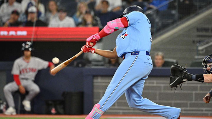 Toronto Blue Jays designated hitter Vladimir Guerrero Jr. (27) hits a two run RBI double against the Boston Red Sox in the third inning at Rogers Centre on Sept 24.