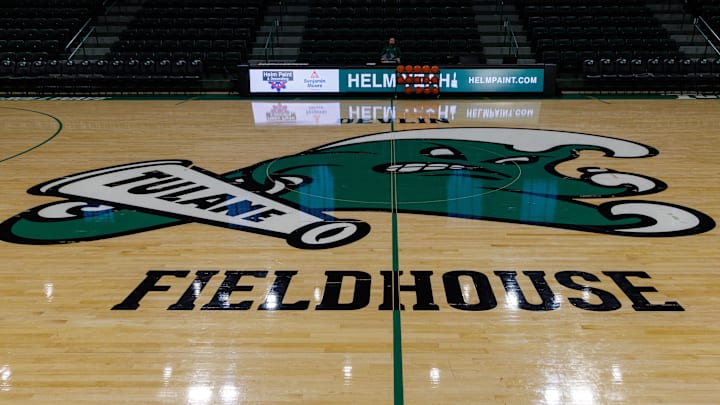 Jan 30, 2025; New Orleans, Louisiana, USA;  Tulane Green Wave logo at mid court before the game against the Memphis Tigers at Avron B. Fogelman Arena in Devlin Fieldhouse.
