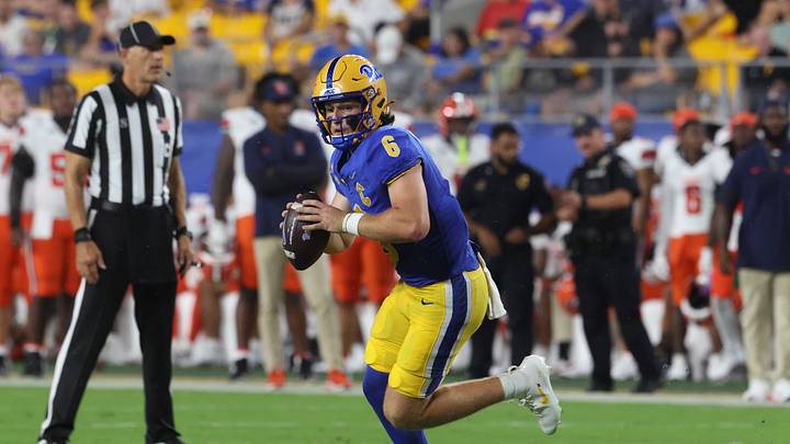 Sep 17, 2026; Pittsburgh, Pennsylvania, USA;  Pittsburgh Panthers quarterback Mason Heintschel (6) runs the ball during the first quarter against the Syracuse Orange at Acrisure Stadium.  Mandatory Credit: Charles LeClaire-Imagn Images