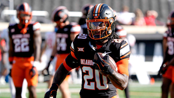 Oklahoma State Cowboys running back Rodney Fields Jr. (20) warms up before a college football game between the Oklahoma State Cowboys (OSU) and the Houston Cougars at Boone Pickens Stadium in Stillwater, Okla., Saturday, Oct. 11, 2025.