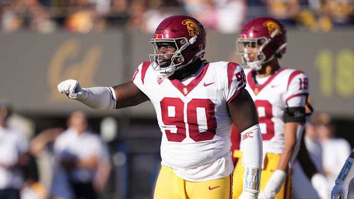 Oct 28, 2023; Berkeley, California, USA; USC Trojans defensive lineman Bear Alexander (90) gestures during the third quarter against the California Golden Bears at California Memorial Stadium. Mandatory Credit: Darren Yamashita-Imagn Images