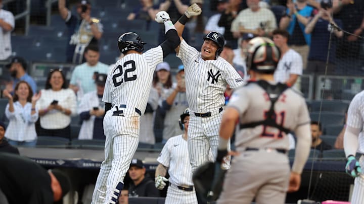 May 8, 2024; Bronx, New York, USA; New York Yankees right fielder Juan Soto (22) celebrates with shortstop Anthony Volpe (11) after hitting a two run home run against the Houston Astros during the first inning at Yankee Stadium.