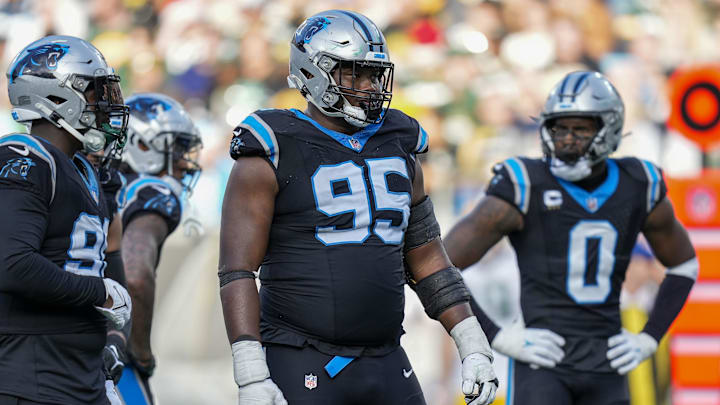 Dec 24, 2023; Charlotte, North Carolina, USA; Carolina Panthers defensive tackle Derrick Brown (95) during the second half against the Green Bay Packers at Bank of America Stadium. Mandatory Credit: Jim Dedmon-Imagn Images