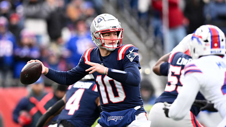 Jan 5, 2025; Foxborough, Massachusetts, USA; New England Patriots quarterback Drake Maye (10) looks to throw against the Buffalo Bills during the first half at Gillette Stadium. Mandatory Credit: Brian Fluharty-Imagn Images