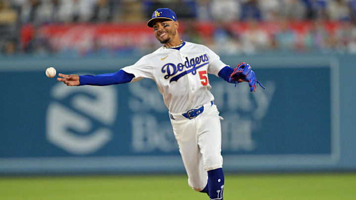 Mar 27, 2026; Los Angeles, California, USA; Los Angeles Dodgers shortstop Mookie Betts (50) throws Arizona Diamondbacks right fielder Corbin Carroll (7) out at first in the fourth inning at Dodger Stadium. Mandatory Credit: Jayne Kamin-Oncea-Imagn Images Mar 27, 2026; Los Angeles, California, USA; Los Angeles Dodgers shortstop Mookie Betts (50) throws Arizona Diamondbacks right fielder Corbin Carroll (7) out at first in the fourth inning at Dodger Stadium. Mandatory Credit: Jayne Kamin-Oncea-Imagn Images