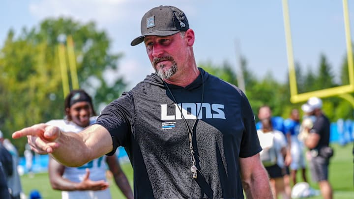Detroit Lions head coach Dan Campbell talks to staff at the end of the joint practice with the Miami Dolphins at the Lions headquarters and training facility in Allen Park, Thursday, Aug. 14 2025