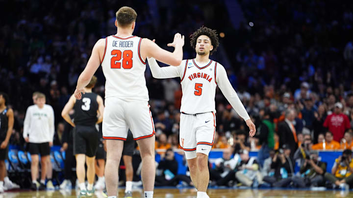Mar 20, 2026; Philadelphia, PA, USA; Virginia Cavaliers guard Sam Lewis (5) and Virginia Cavaliers forward Thijs de Ridder (28) celebrate after the game against the Wright State Raiders during a first round game of the men's 2026 NCAA Tournament at Xfinity Mobile Arena. Mandatory Credit: Kyle Ross-Imagn Images