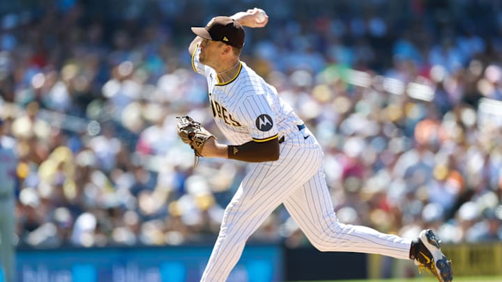 Jul 30, 2025; San Diego, California, USA; San Diego Padres relief pitcher Jason Adam (40) throws a pitch during the eighth inning against the New York Mets at Petco Park. Mandatory Credit: David Frerker-Imagn Images