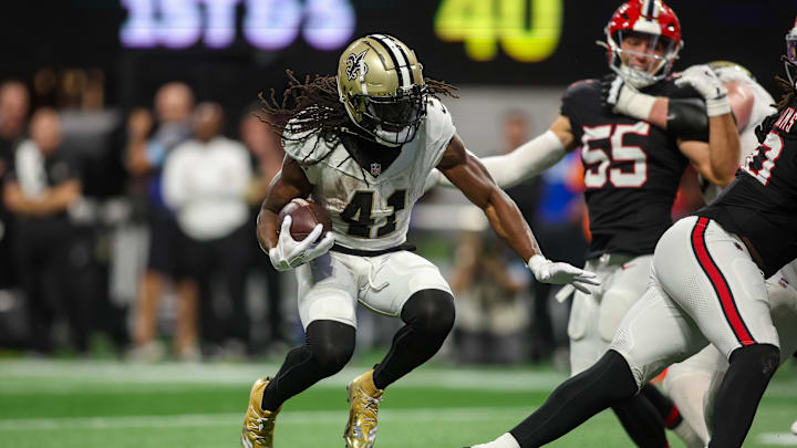 Sep 29, 2024; Atlanta, Georgia, USA; New Orleans Saints running back Alvin Kamara (41) runs the ball against the Atlanta Falcons in the fourth quarter at Mercedes-Benz Stadium. Mandatory Credit: Brett Davis-Imagn Images