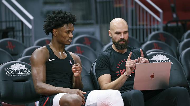 Nov 4, 2024; Houston, Texas, USA; Houston Rockets forward Amen Thompson (left) talks with coach Ben Sullivan before the game against the New York Knicks at Toyota Center. Mandatory Credit: Troy Taormina-Imagn Images