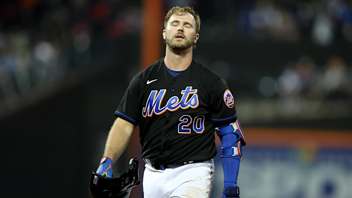 May 13, 2022; New York City, New York, USA; New York Mets first baseman Pete Alonso (20) reacts after flying out to the wall against the Seattle Mariners during the eighth inning at Citi Field. Mandatory Credit: Brad Penner-Imagn Images