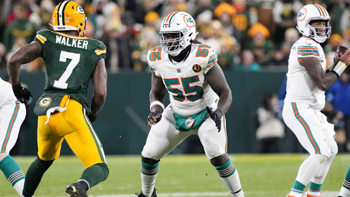 Miami Dolphins offensive lineman Aaron Brewer (55) during the game against the Green Bay Packers at Lambeau Field. Miami Dolphins offensive lineman Aaron Brewer (55) during the game against the Green Bay Packers at Lambeau Field.