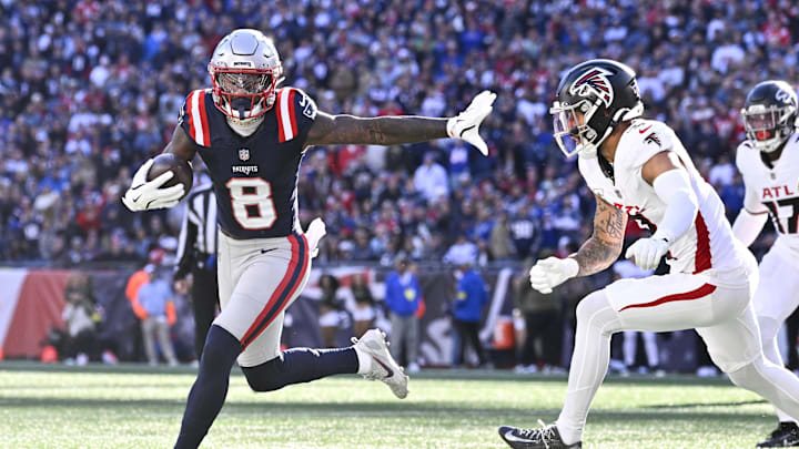 Nov 2, 2025; Foxborough, Massachusetts, USA;  New England Patriots wide receiver Stefon Diggs (8) runs for a touchdown against Atlanta Falcons safety Jessie Bates III (3) during the first half at Gillette Stadium. Mandatory Credit: Eric Canha-Imagn Images