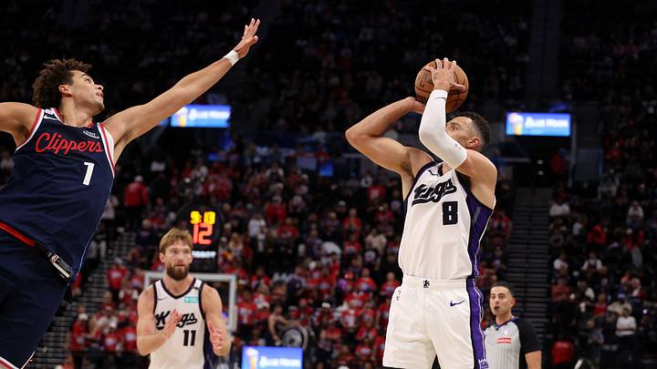 Oct 21, 2026; Inglewood, California, USA;  Sacramento Kings guard Zach LaVine (8) shoots the ball against Los Angeles Clippers guard Keaton Wagler (1) during the fourth quarter at Intuit Dome. Mandatory Credit: Kiyoshi Mio-Imagn Images