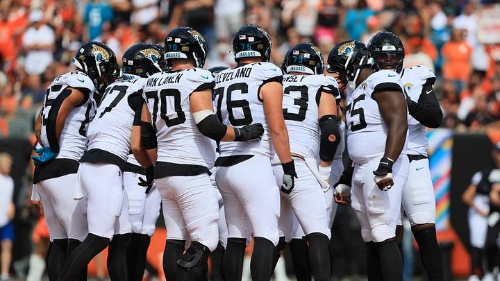 Oct 4, 2026; Cincinnati, Ohio, USA;  Jacksonville Jaguars players talk on the field during the first quarter against the Cincinnati Bengals at Paycor Stadium.  Mandatory Credit: Katie Stratman-Imagn Images