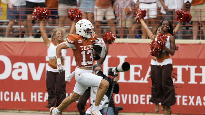 Sep 6, 2025; Austin, Texas, USA; Texas Longhorns wide receiver Parker Livingstone (13) runs for a touchdown during the first half against the San Jose State Spartansat Darrell K Royal-Texas Memorial Stadium. Mandatory Credit: Scott Wachter-Imagn Images