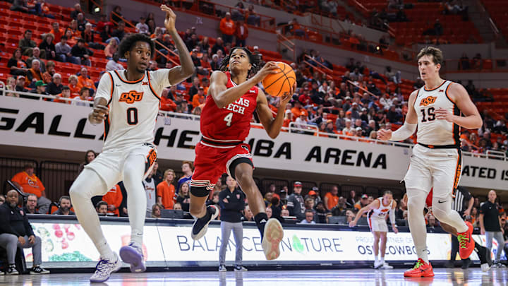 Feb 15, 2025; Stillwater, Oklahoma, USA; Texas Tech Red Raiders guard Christian Anderson (4) drives to the basket around Oklahoma State Cowboys forward Marchelus Avery (0) during the second half at Gallagher-Iba Arena. Mandatory Credit: William Purnell-Imagn Images Feb 15, 2025; Stillwater, Oklahoma, USA; Texas Tech Red Raiders guard Christian Anderson (4) drives to the basket around Oklahoma State Cowboys forward Marchelus Avery (0) during the second half at Gallagher-Iba Arena. Mandatory Credit: William Purnell-Imagn Images