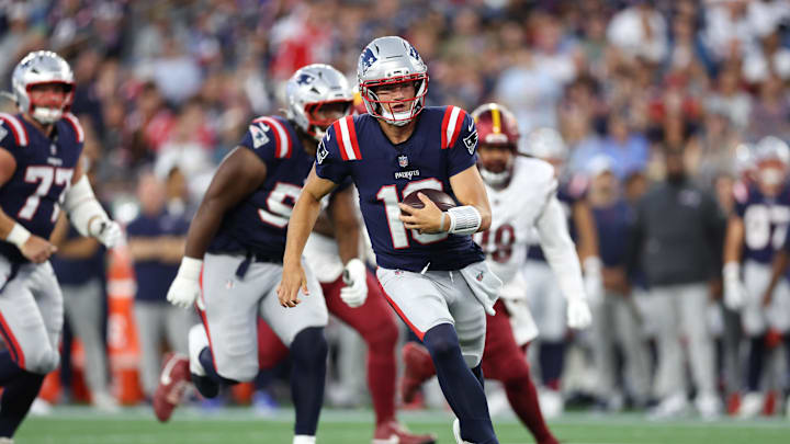 Aug 8, 2025; Foxborough, Massachusetts, USA; New England Patriots quarterback Drake Maye (10) runs the ball during the first half against the Washington Commanders at Gillette Stadium. Mandatory Credit: Paul Rutherford-Imagn Images