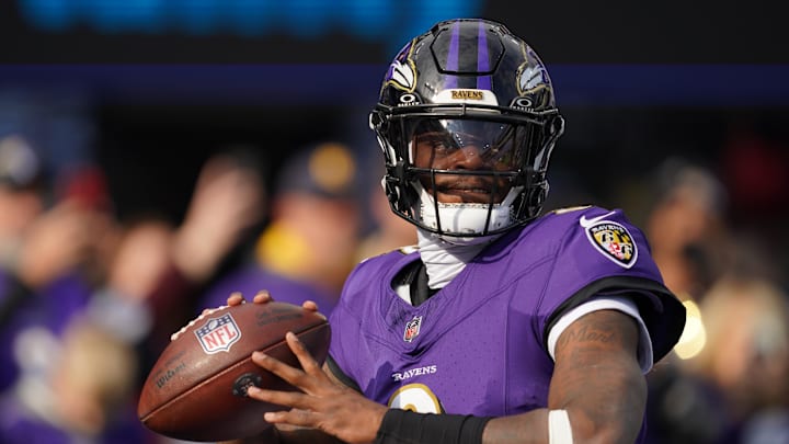Nov 23, 2025; Baltimore, Maryland, USA; Baltimore Ravens quarterback Lamar Jackson (8) warms up before the game against the New York Jets at M&T Bank Stadium. Mandatory Credit: Mitch Stringer-Imagn Images