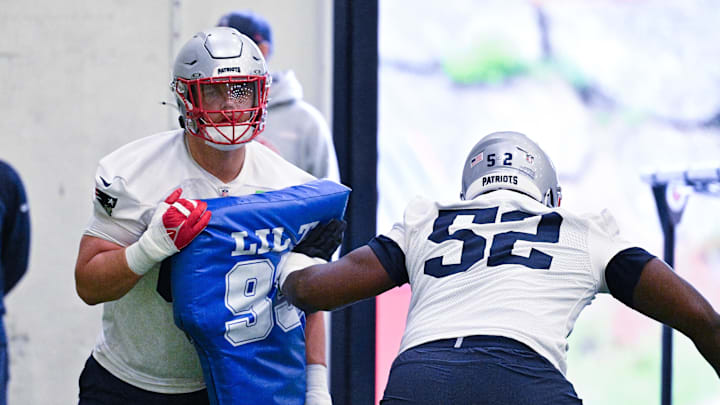 Jun 10, 2025; Foxborough, MA, USA; New England Patriots offensive tackle Will Campbell (66) works with New England Patriots offensive tackle Marcus Bryant (52)  during minicamp held in the WIN Field House at Gillette Stadium. Mandatory Credit: Eric Canha-Imagn Images