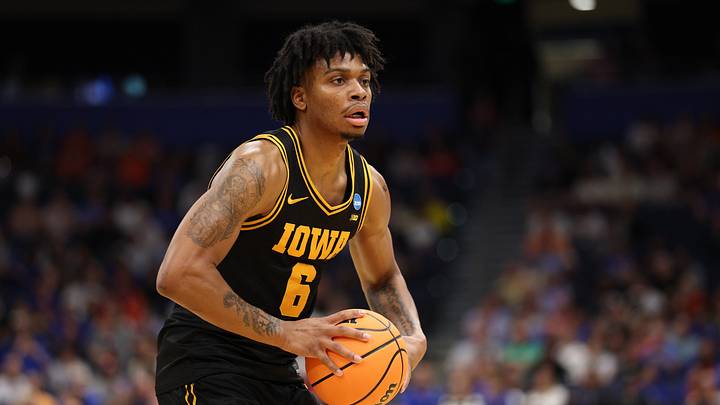 Mar 20, 2026; Tampa, FL, USA; Iowa Hawkeyes forward Tavion Banks (6) passes the ball in the first half against the Clemson Tigers during a first round game of the men's 2026 NCAA Tournament at Benchmark International Arena. Mandatory Credit: Nathan Ray Seebeck-Imagn Images