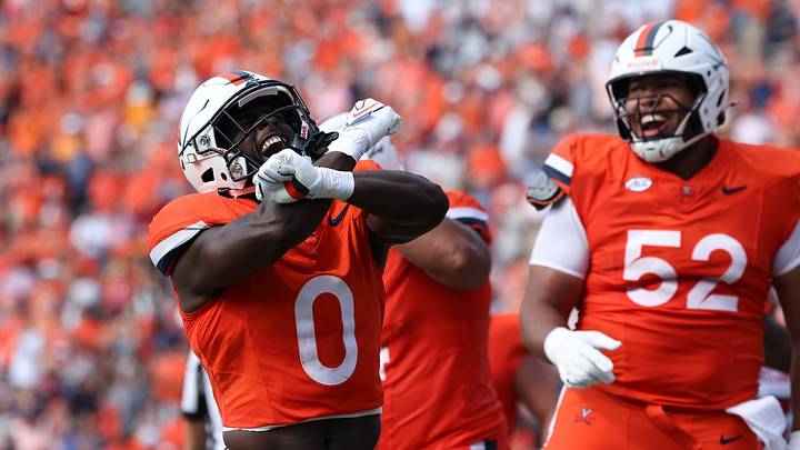 Aug 29, 2026; Charlottesville, Virginia, USA; Virginia Cavaliers running back Xavier Brown (0) celebrates a touchdown during the second quarter against North Carolina State Wolfpack at Scott Stadium. Mandatory Credit: Greg Atkins-Imagn Images Aug 29, 2026; Charlottesville, Virginia, USA; Virginia Cavaliers running back Xavier Brown (0) celebrates a touchdown during the second quarter against North Carolina State Wolfpack at Scott Stadium. Mandatory Credit: Greg Atkins-Imagn Images