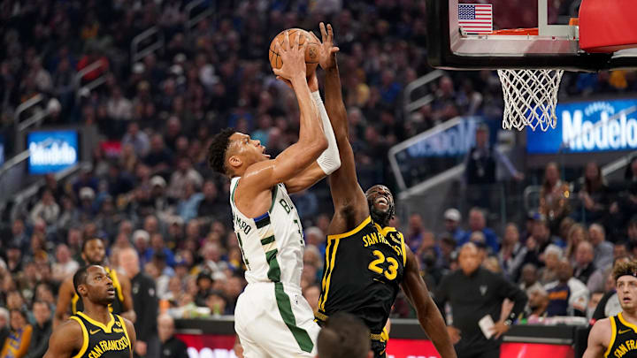 Milwaukee Bucks forward Giannis Antetokounmpo and Golden State Warriors forward Draymond Green