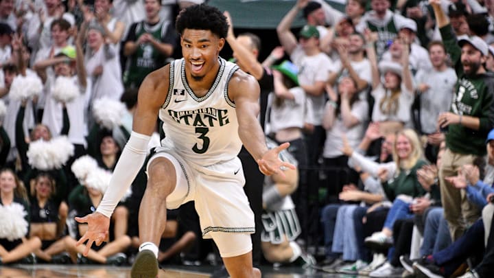Nov 19, 2024; East Lansing, Michigan, USA;  Michigan State Spartans guard Jaden Akins (3) celebrates a three point shot during the first half against the Samford Bulldogs at Jack Breslin Student Events Center. Mandatory Credit: Dale Young-Imagn Images