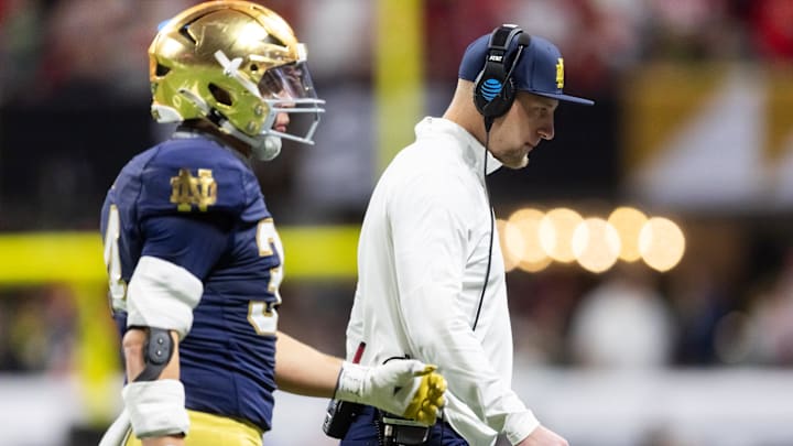 Jan 20, 2025; Atlanta, GA, USA; Notre Dame Fighting Irish linebackers coach Max Bullough against the Ohio State Buckeyes during the CFP National Championship college football game at Mercedes-Benz Stadium. Mandatory Credit: Mark J. Rebilas-Imagn Images