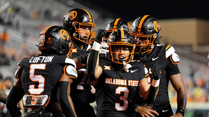 Oklahoma State Cowboys running back Sesi Vailahi (3) celebrates a touchdown in the second half the college football game between the Oklahoma State Cowboys and the Arizona State Sun Devils at Boone Pickens Stadium in Stillwater, Okla., Saturday, Nov., 2, 2024.