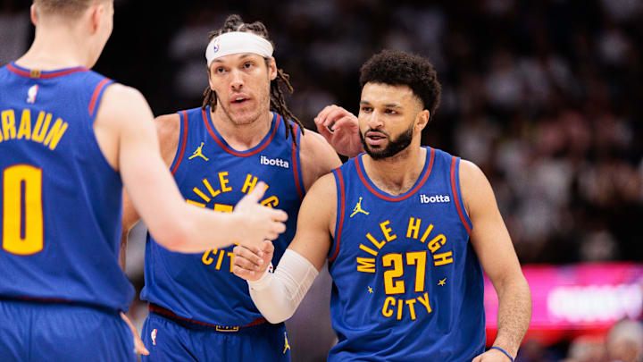 Apr 20, 2024; Denver, Colorado, USA; Denver Nuggets guard Jamal Murray (27) and forward Aaron Gordon (50) react during the fourth quarter against the Los Angeles Lakers in game one of the first round for the 2024 NBA playoffs at Ball Arena.