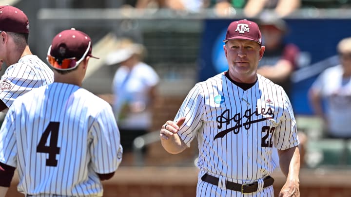 Jun 8, 2024; College Station, TX, USA; Texas A&M head coach Jim Schlossnagle greets players during introductions prior to the game against the Oregon at Olsen Field, Blue Bell Park Mandatory Credit: Maria Lysaker-USA TODAY Sports