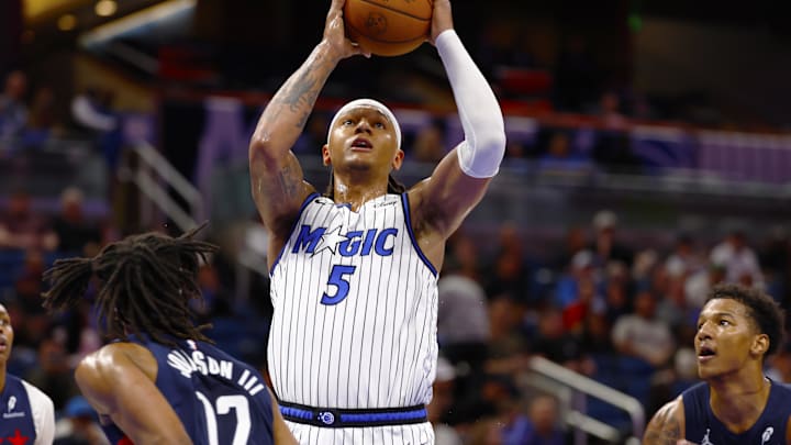Mar 3, 2026; Orlando, Florida, USA;  Orlando Magic forward Paolo Banchero (5) takes a shot in the second half against the Washington Wizards at Kia Center. Mandatory Credit: Russell Lansford-Imagn Images