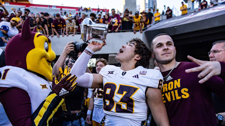 Nov 30, 2024; Tucson, Arizona, USA; Arizona State Sun Devils wide receiver Derek Eusebio (83) drinks out of the Territorial Cup at the end of the game against the Arizona Wildcats at Arizona Stadium. Mandatory Credit: Aryanna Frank-Imagn Images