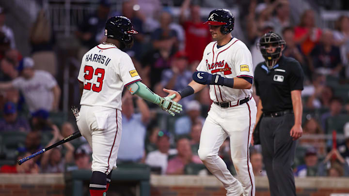 Atlanta Braves third baseman Austin Riley celebrates with center fielder Michael Harris II Atlanta Braves third baseman Austin Riley celebrates with center fielder Michael Harris II