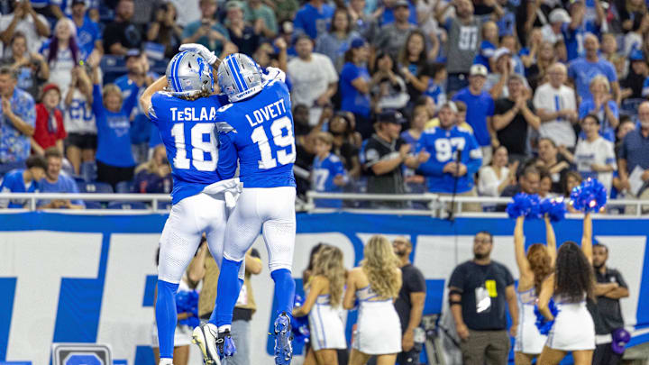 Aug 23, 2025; Detroit, Michigan, USA; Detroit Lions wide receiver Isaac TeSlaa (18) celebrates his touchdown against the Houston Texans with wide receiver Dominic Lovett (19) during the first half at Ford Field. Mandatory Credit: David Reginek-Imagn Images