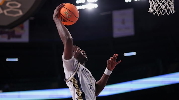 Feb 18, 2026; Atlanta, Georgia, USA; Georgia Tech Yellow Jackets forward Baye Ndongo (11) dunks against the Virginia Cavaliers in the second half at McCamish Pavilion. Mandatory Credit: Brett Davis-Imagn Images
