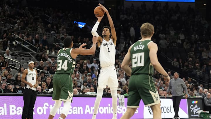Jan 31, 2025; San Antonio, Texas, USA; San Antonio Spurs center Victor Wembanyama (1) shoots over Milwaukee Bucks forward Giannis Antetokounmpo (34) during the first half at Frost Bank Center. Mandatory Credit: Scott Wachter-Imagn Images