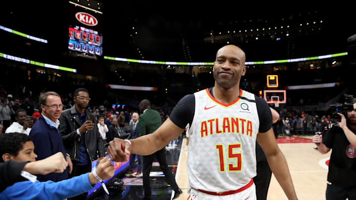 Mar 11, 2020; Atlanta, Georgia, USA; Atlanta Hawks guard Vince Carter (15) fist bumps fans after an