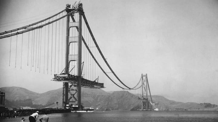 The Golden Gate Bridge under construction.